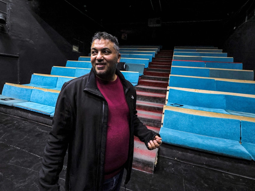 caption: Detained theater artist Mustafa Sheta in Jenin's Freedom Theatre in 2022.