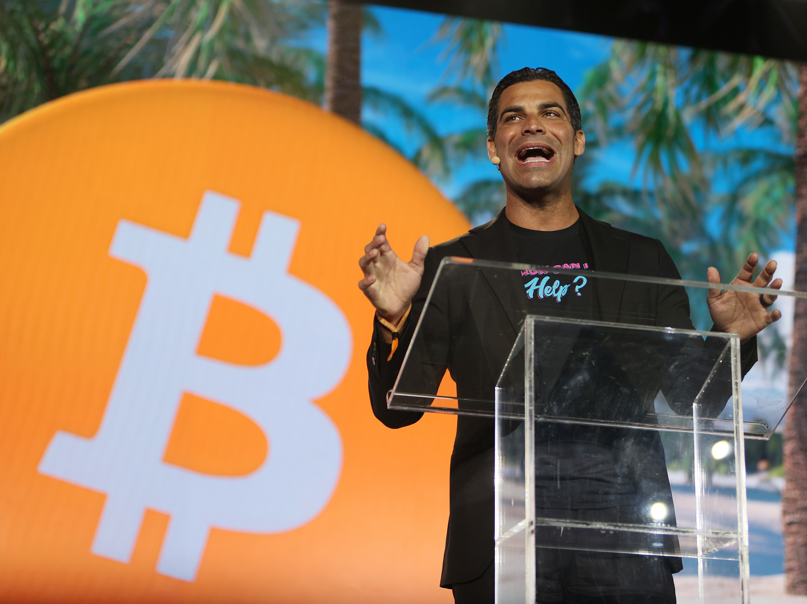 caption: Miami Mayor Francis Suarez speaks at the Bitcoin 2021 Convention, a crypto-currency conference held at the Mana Wynwood convention center in Miami on June 4. Suarez is aggressively pitching Miami as a top destination for cryptocurrency companies.