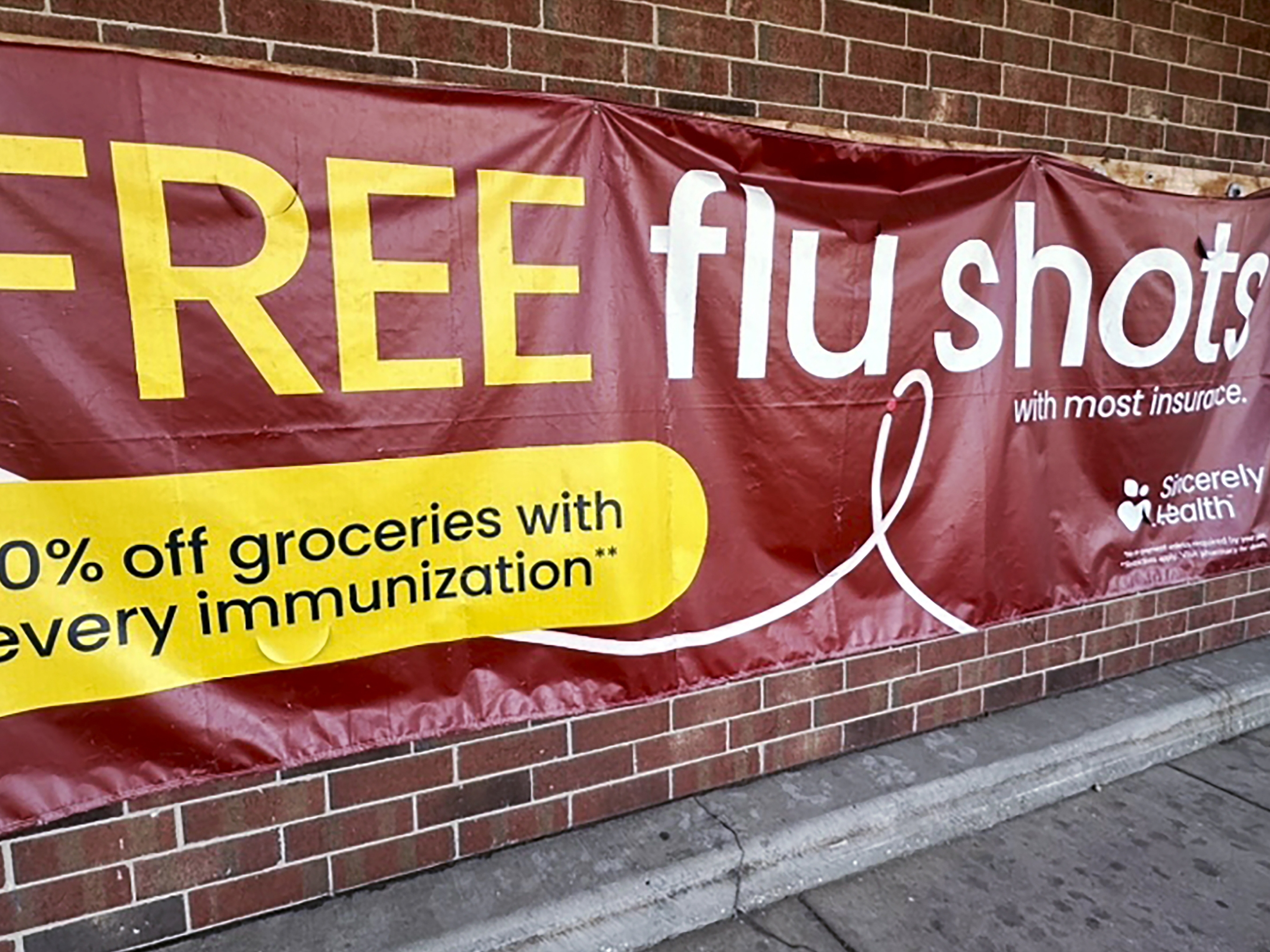 caption: Even as flu cases rise, it's still not too late to get vaccinated.