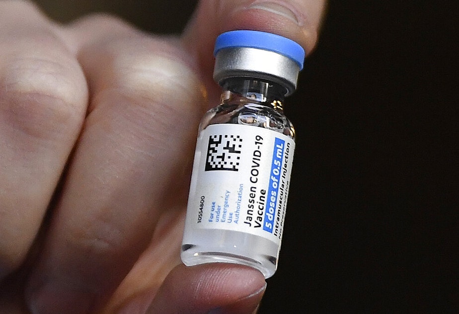 caption: Johnson & Johnson COVID-19 vaccine is held by pharmacist Madeline Acquilano at Hartford Hospital in Hartford, Conn., Wednesday, March 3, 2021. 