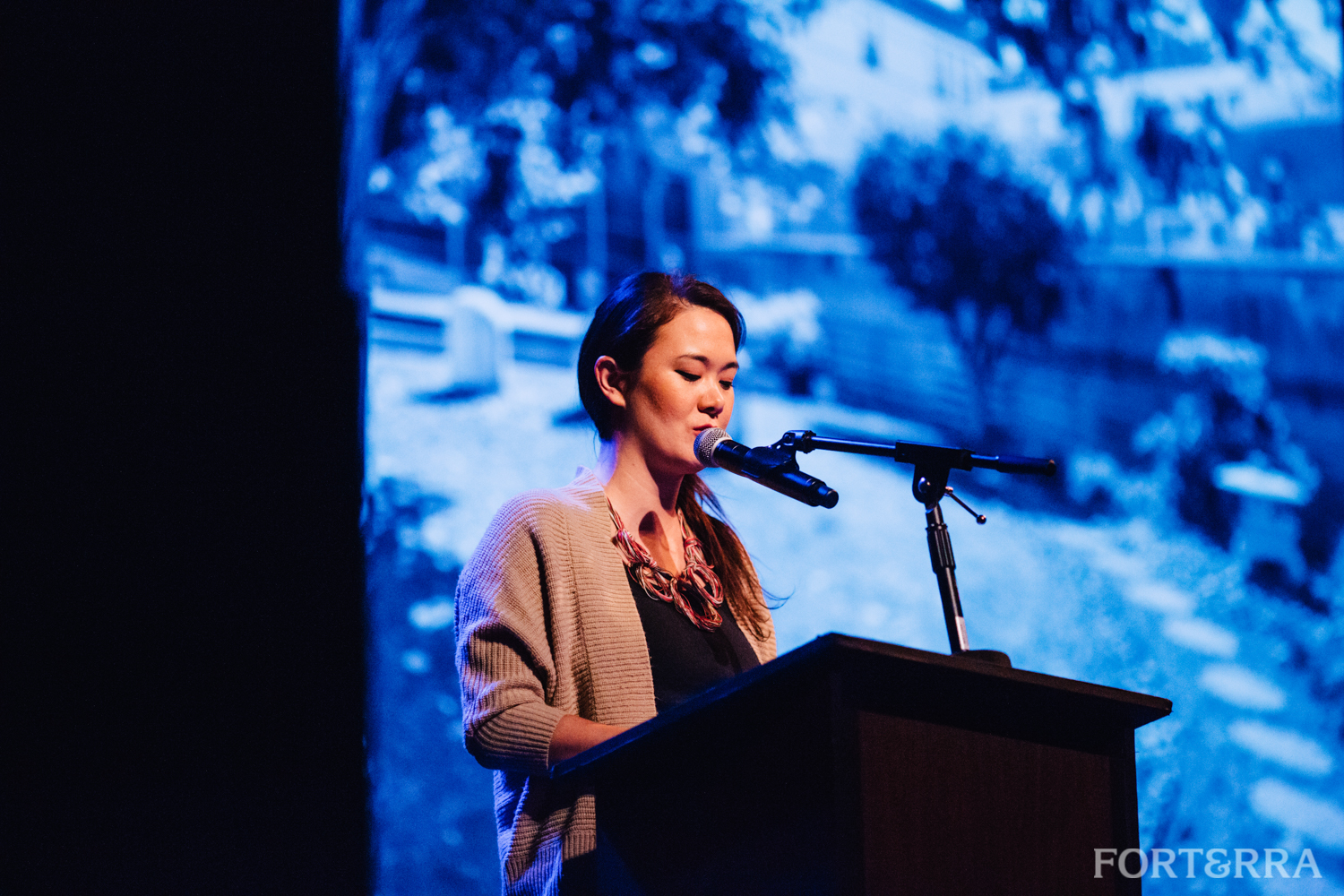 caption: Keiko Green reads 'the garden at higo' at Ampersand Live