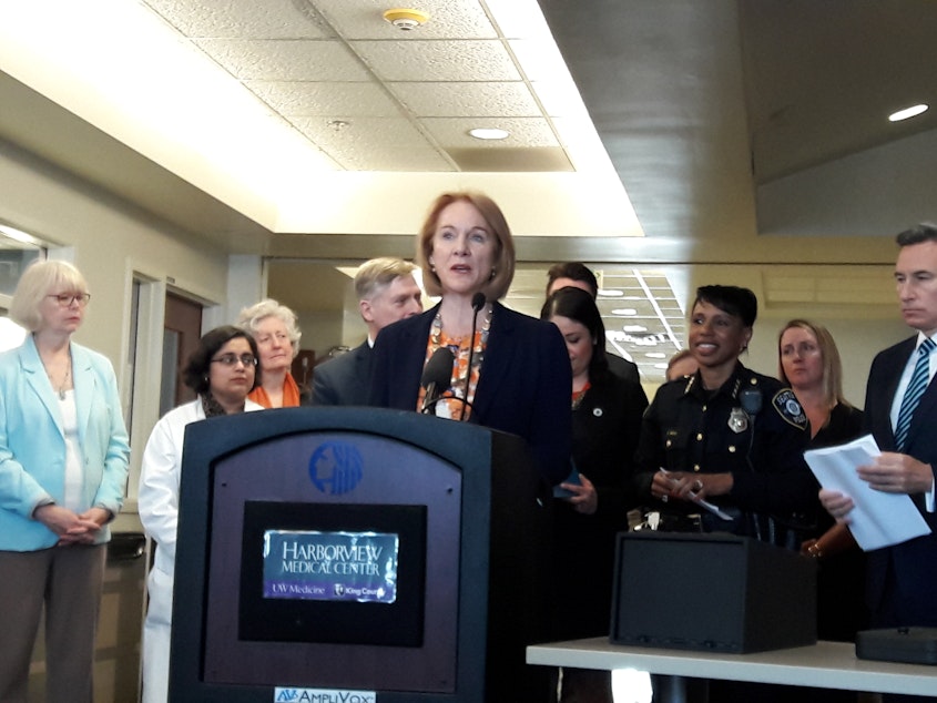 caption: Seattle Mayor Jenny Durkan announced her plan to seek safe storage legislation in March at Harborview Medical Center. 