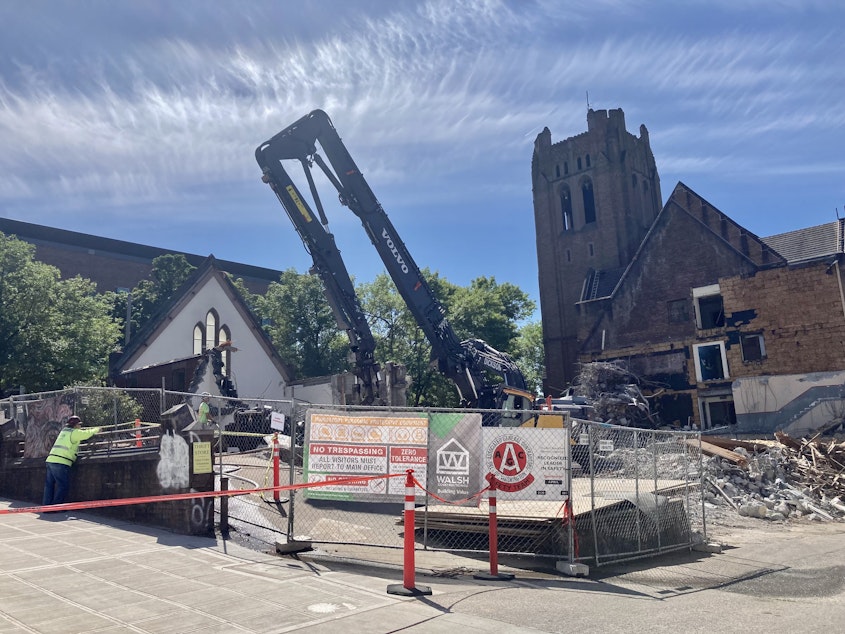 caption: The historic University Temple United Methodist Church on 15th Avenue in Seattle's University District was demolished on June 18, 2021.