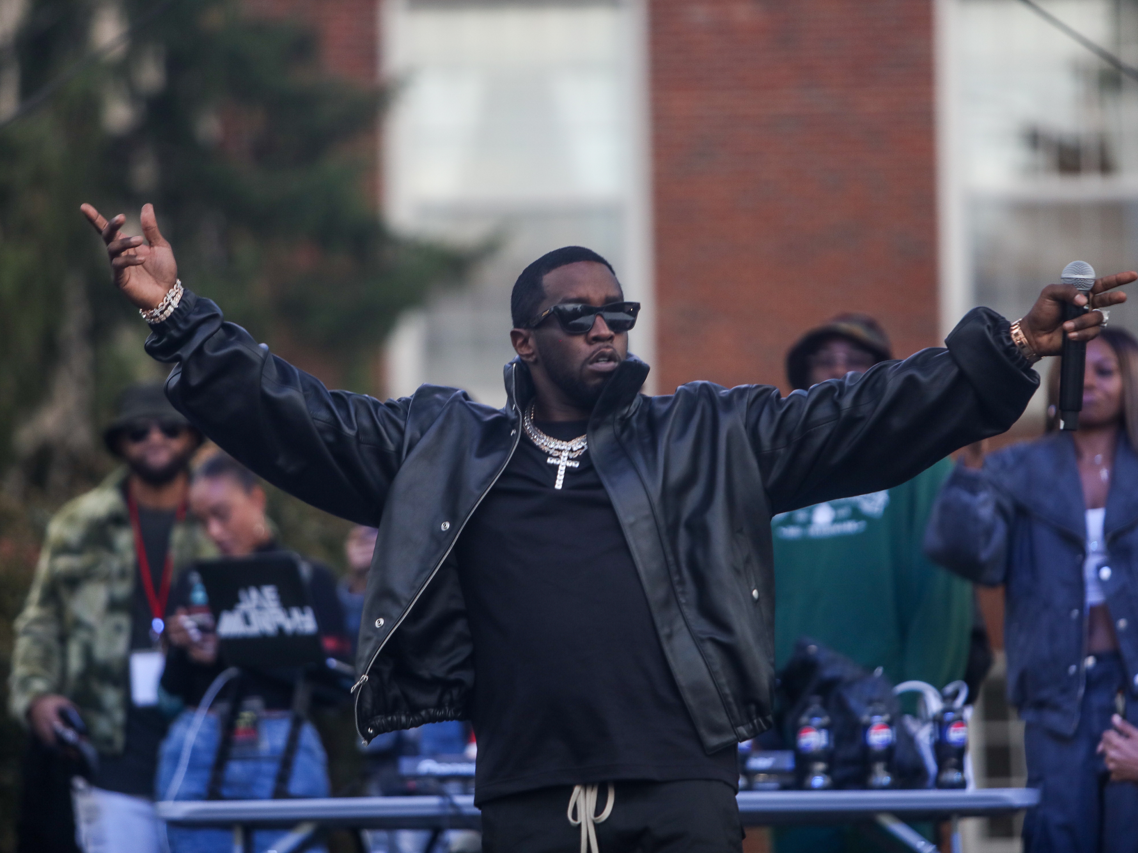 caption: Sean "Diddy" Combs performs in 2023 at Howard University's Yardfest in Washington, D.C.