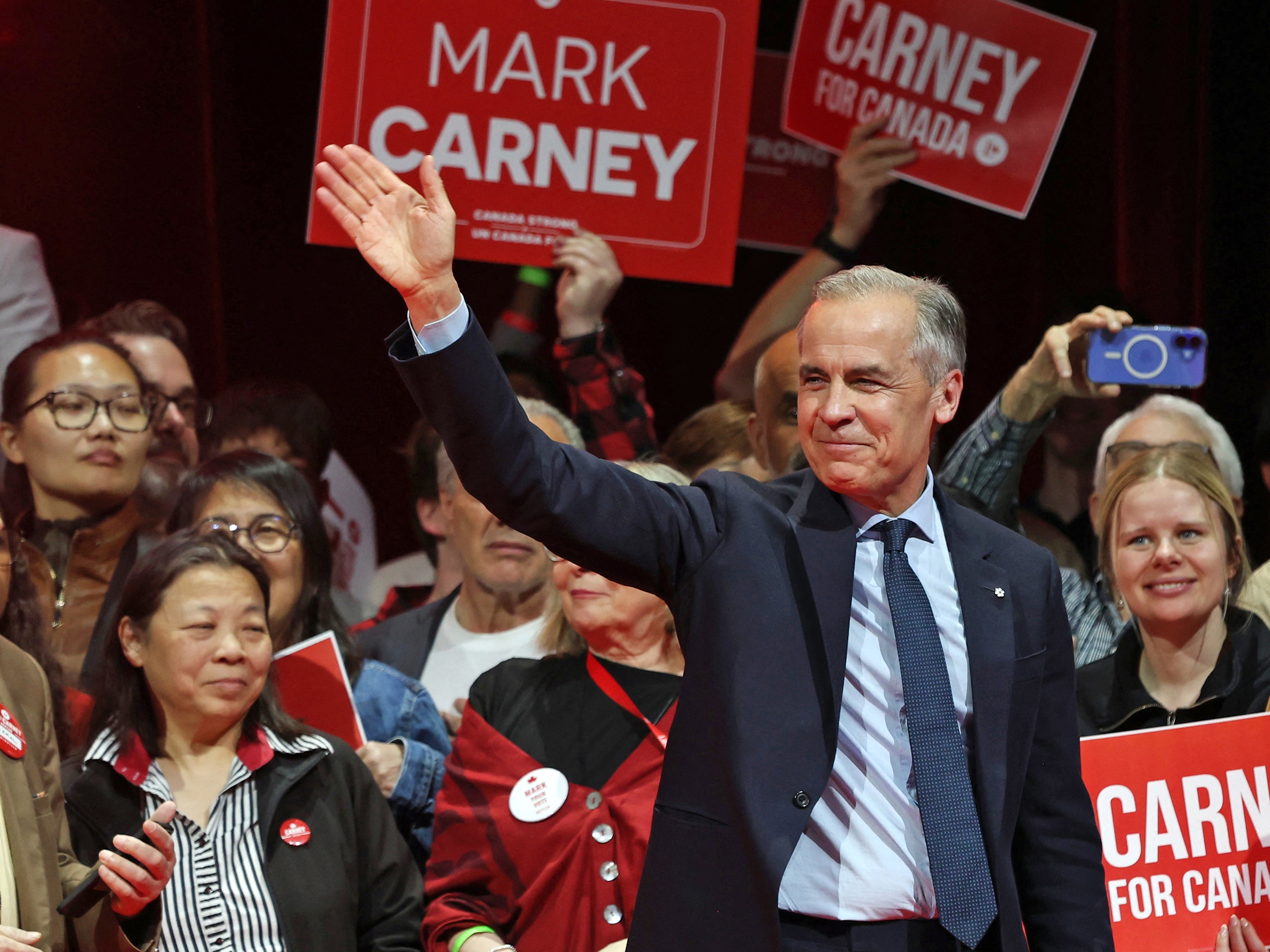 caption: Canadian Prime Minister Mark Carney holds an election rally in Windsor, Ontario, on April 26.