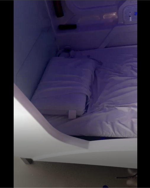 caption: This photo shows an image of a sleeping pod Pearl said she was held captive in.