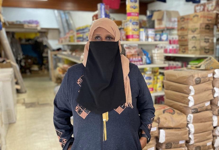 caption: Asha Gobana of Balageru International Mart on Rainier Avenue South.