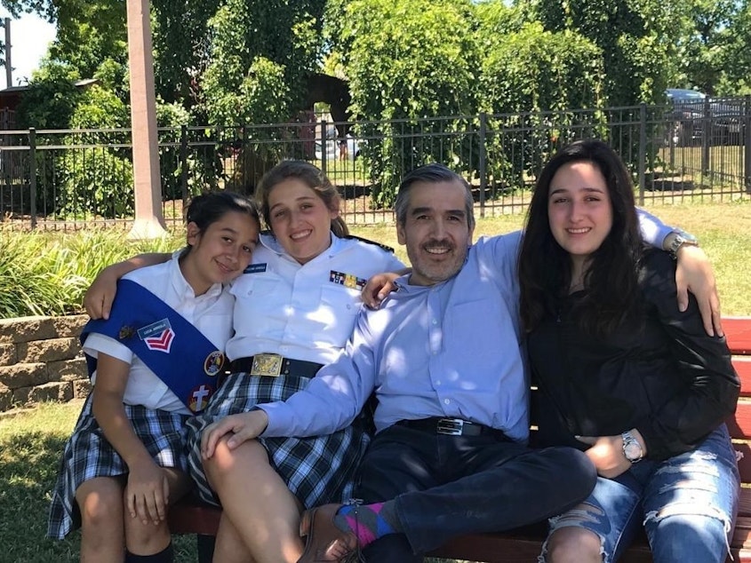 caption: Lucio Arreola and his daughters Lucia (from left), Paulina and Maria.