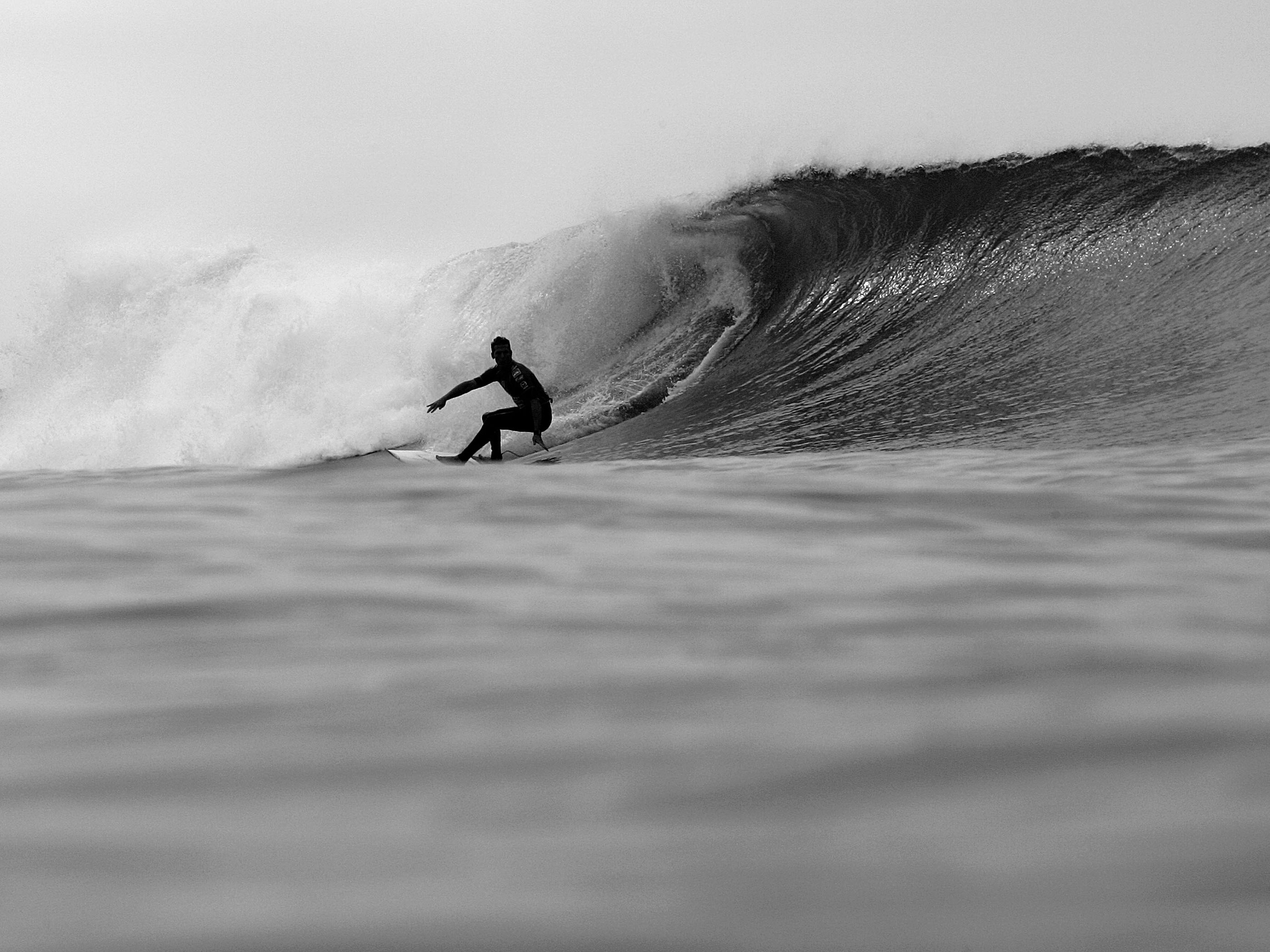 caption: Andy Irons of Hawaii takes a bottom turn on a wave during the Boost Mobile Pro, Part of the Foster's ASP Men's World Surfing Tour on Sept. 18, 2005, at Lower Trestles in San Clemente, Calif.