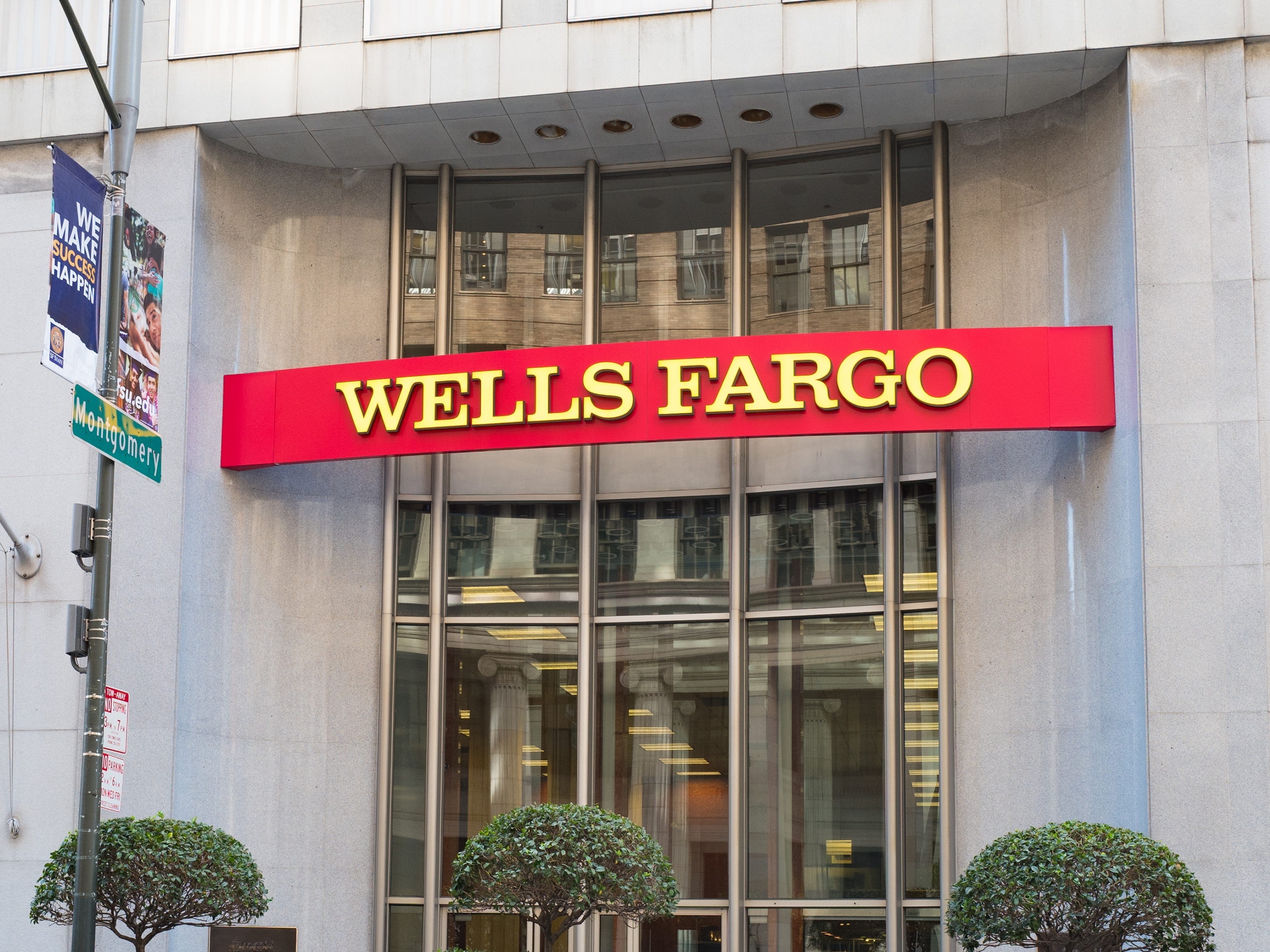 caption: Wells Fargo, which has endured a cascade of scandals in recent years, announced Monday that two board members have resigned.