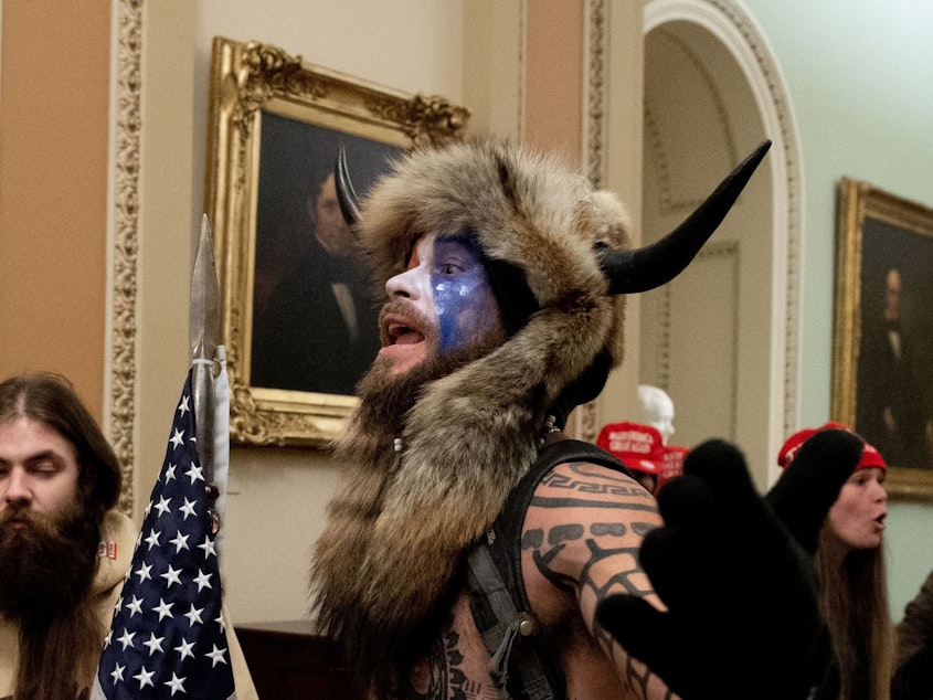 caption: The Justice Department announced Saturday that it had charged the man known as the "QAnon shaman," Jacob Anthony Chansley in connection with the Capitol break-in on Wednesday.