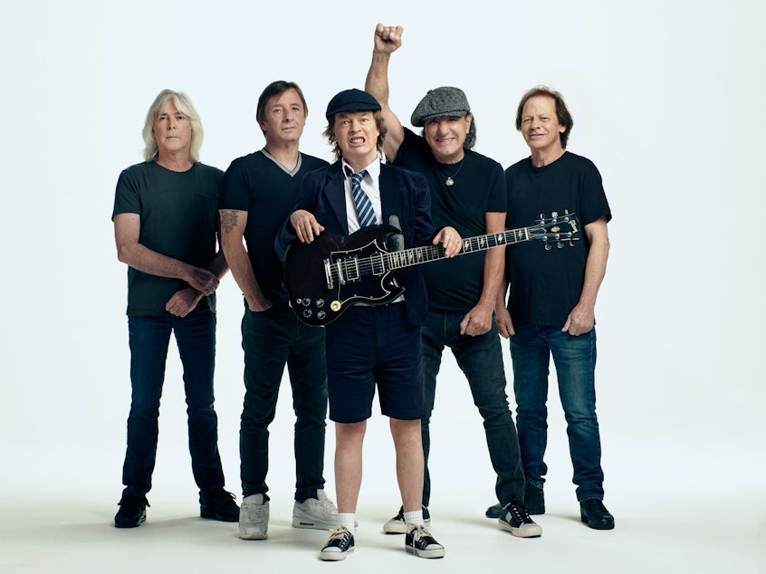 caption: AC/DC, left to right: Cliff Williams, Phil Rudd, Angus Young, Brian Johnson, Stevie Young.
