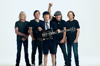 caption: AC/DC, left to right: Cliff Williams, Phil Rudd, Angus Young, Brian Johnson, Stevie Young.