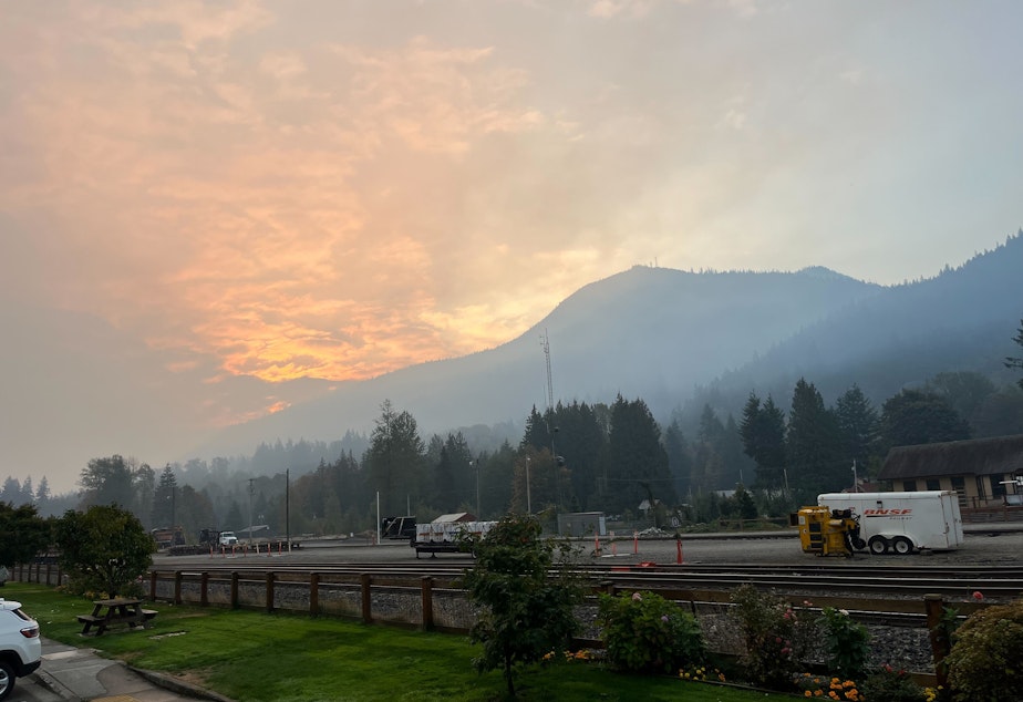 caption: Smoke from the Bolt Creek fire lingers over Skykomish, Wash. Sept. 30, 2022. 