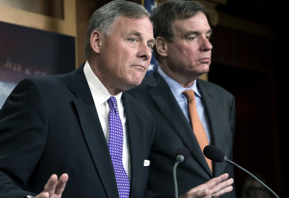 Senate Select Committee on Intelligence Chairman Richard Burr, R-N.C., left, and Vice Chairman Mark Warner, D-Va., released a new report on how Russians used social media targeting to meddle with the 2016 election.