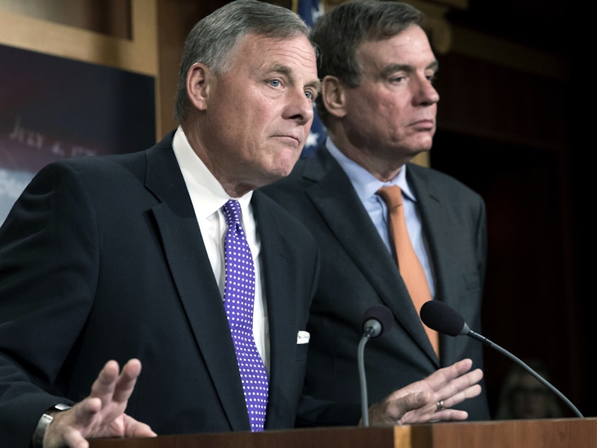 caption: Senate Select Committee on Intelligence Chairman Richard Burr, R-N.C., left, and Vice Chairman Mark Warner, D-Va., released a new report on how Russians used social media targeting to meddle with the 2016 election.