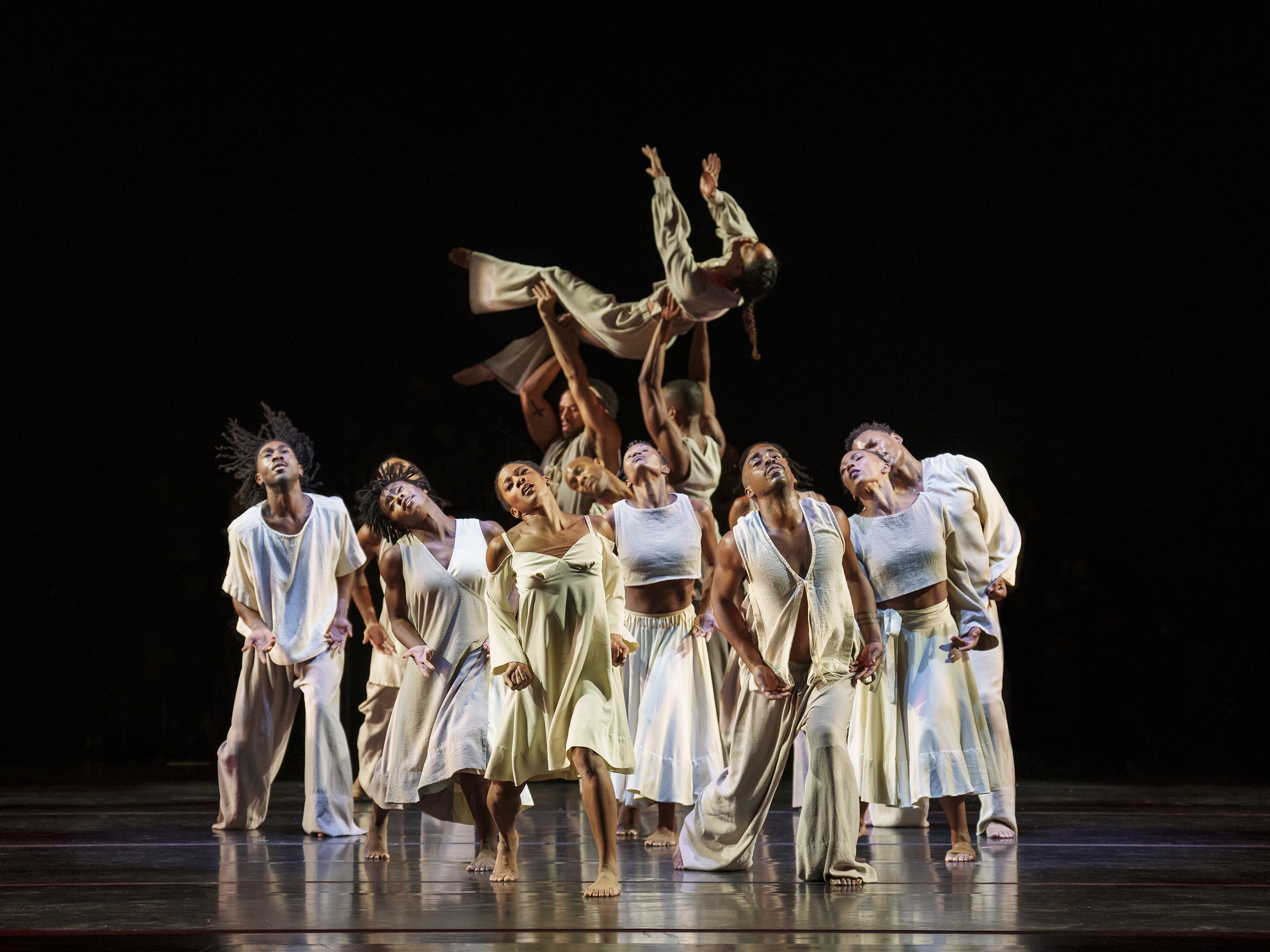 caption: The Alvin Ailey American Dance Theater performs <em>Sacred Songs</em>, choreographed by interim artistic director Matthew Rushing based on material featured in the original 1960 version of the company's <em>Revelations</em>.