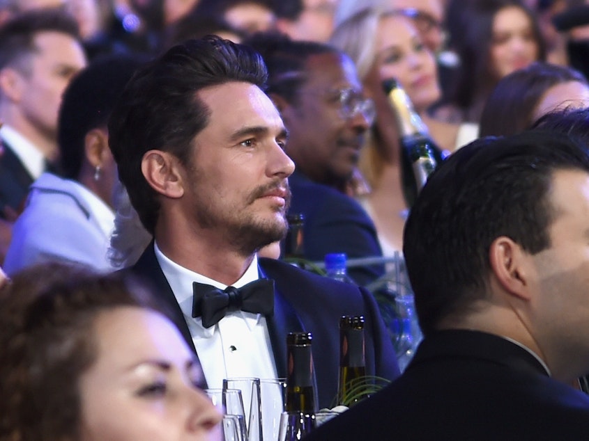 caption: James Franco, shown here at the Screen Actors Guild Awards in 2018, has been served with a lawsuit alleging sexual exploitation and fraud.