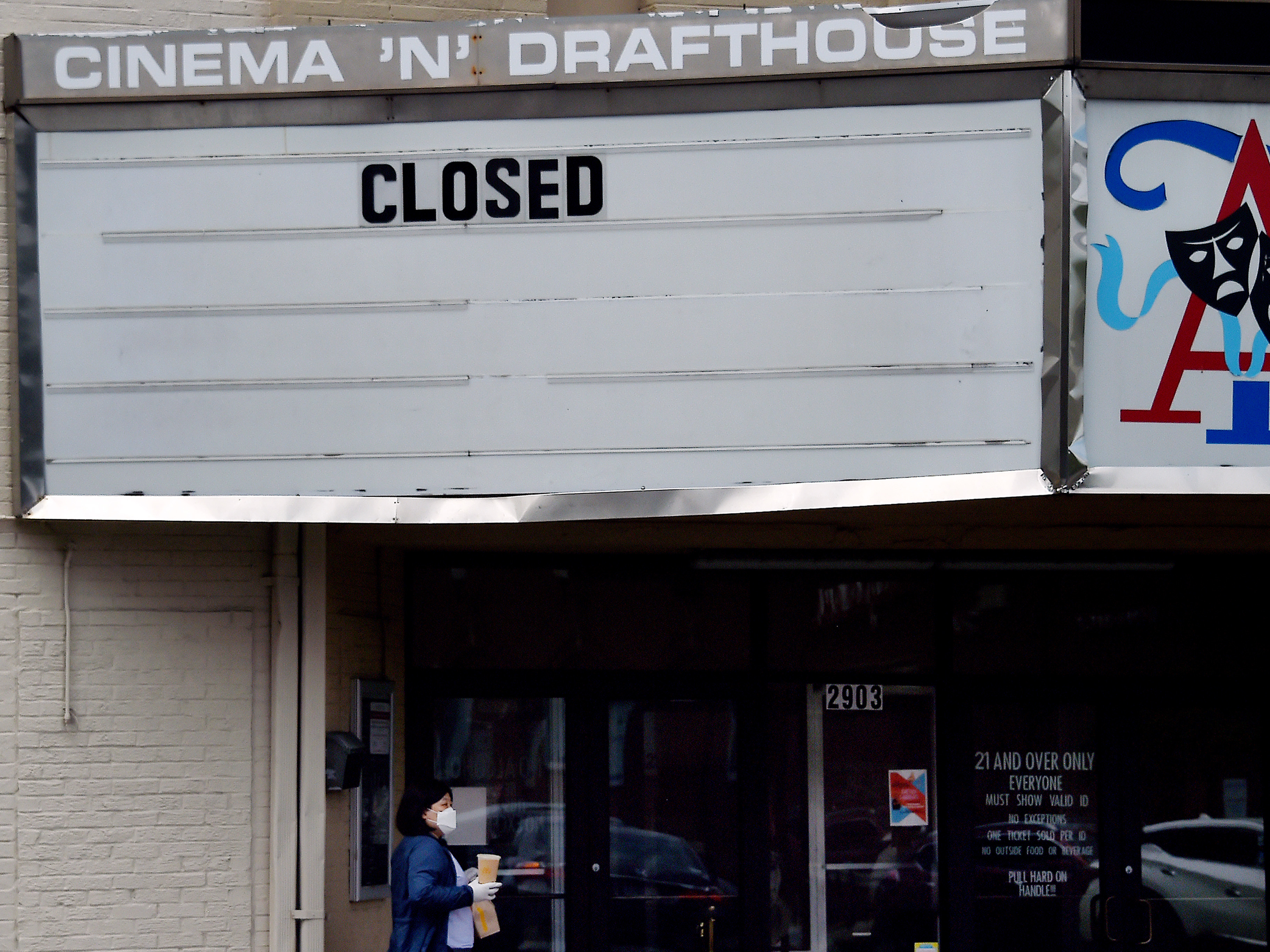 caption: With coronavirus cases surging in December, restaurants, movie theaters and other businesses that rely on in-person traffic struggled, weighing on the U.S. job market.