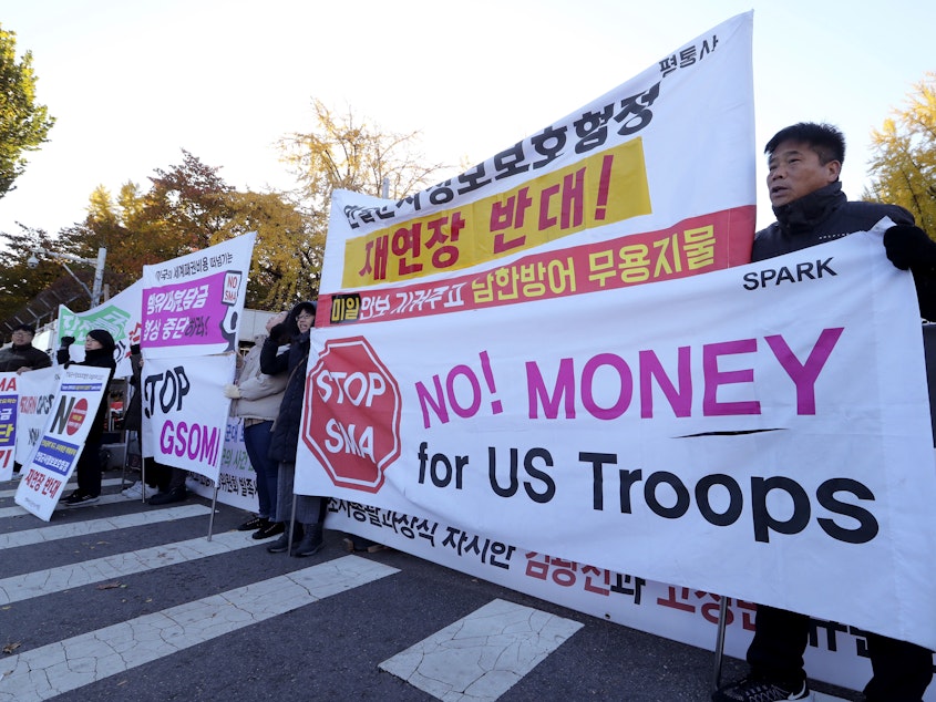 caption: Protesters in Seoul, South Korea, on Nov. 14 march ahead of a visit by U.S. Defense Secretary Mark Esper.