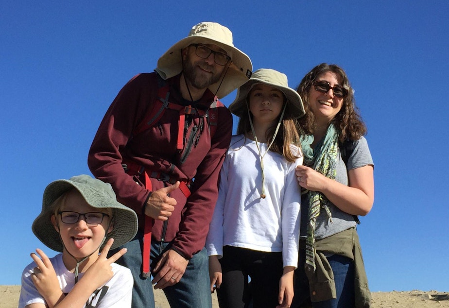 caption: From left: Franklin, Sam, Josie, and Jen Jansons after hiking in 2019.