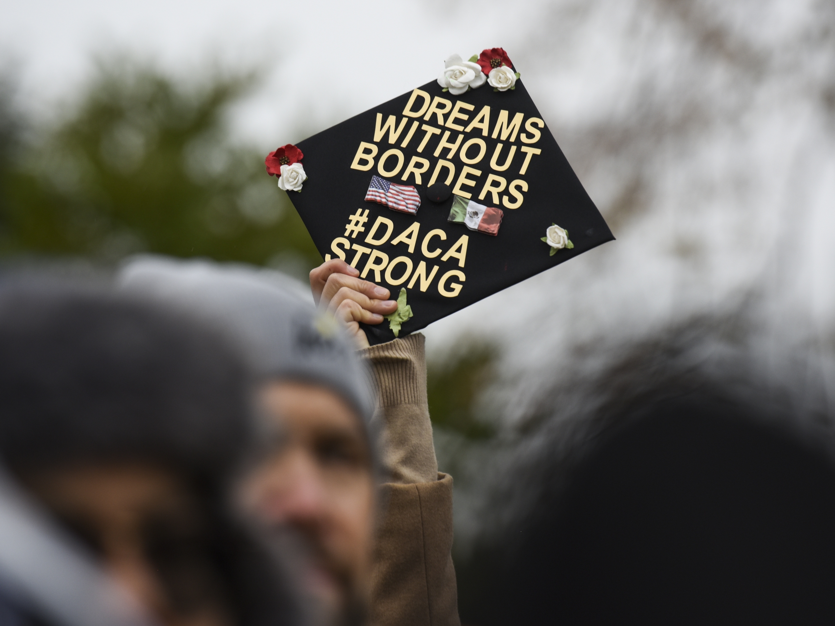 caption: Demonstrators gather in front of the U.S. Supreme Court in 2019 when the Court heard arguments on Deferred Action for Childhood Arrivals after the Trump administration tried to wind it down.