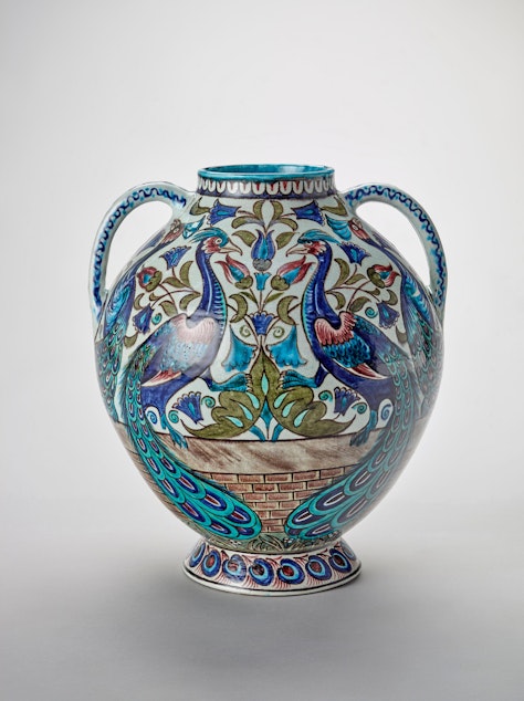 caption: William De Morgan's peacock vase inspired many bakers at SAM's Great Victorian Radicals Bake Off. 