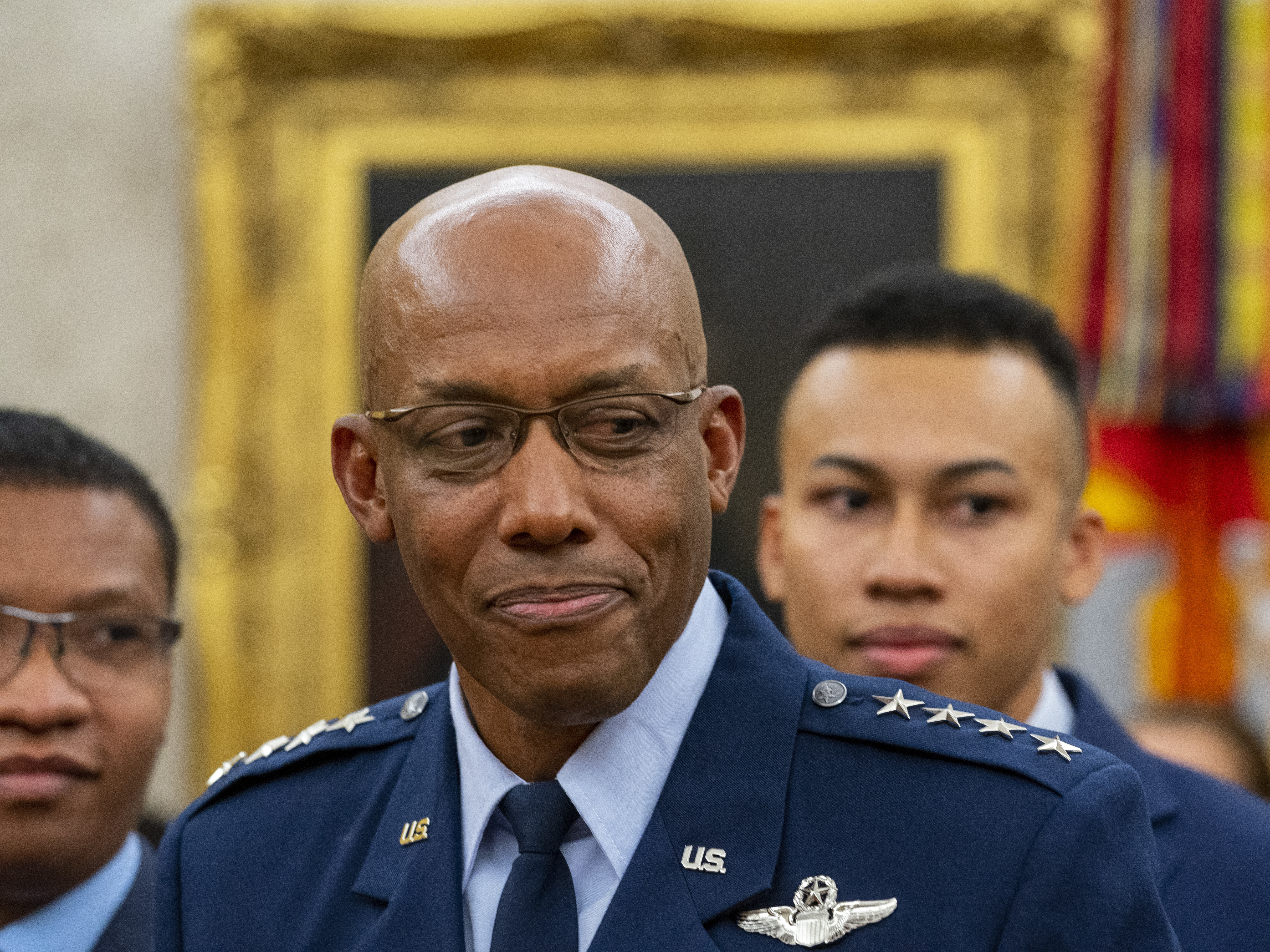 caption: Gen. Charles Q. Brown smiles at a White House swearing-in ceremony for the post of chief of staff of the Air Force.