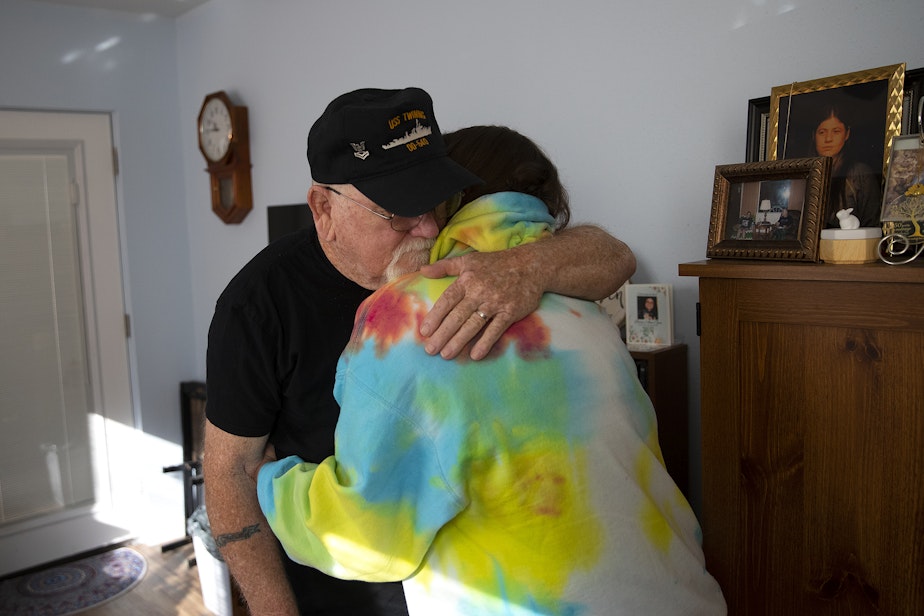 caption: Rita Cooper shares a hug with her father, Allan Opie, on Thursday, October 19, 2023, at their home in Cashmere. Cooper has been caring for her father for the last 3 years. 
