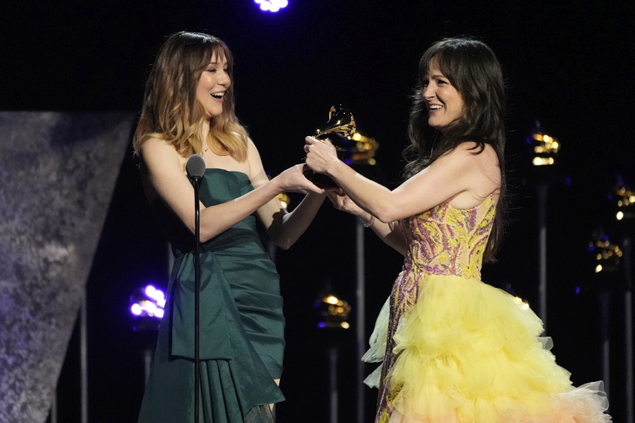 caption: Molly Tuttle, left, presents Sara Gazarek, with the award for best arrangement, instruments and vocals for "In the Wee Small Hours of the Morning" - Saje featuring Jacob Collier during the 66th annual Grammy Awards on Sunday, Feb. 4, 2024, in Los Angeles. 