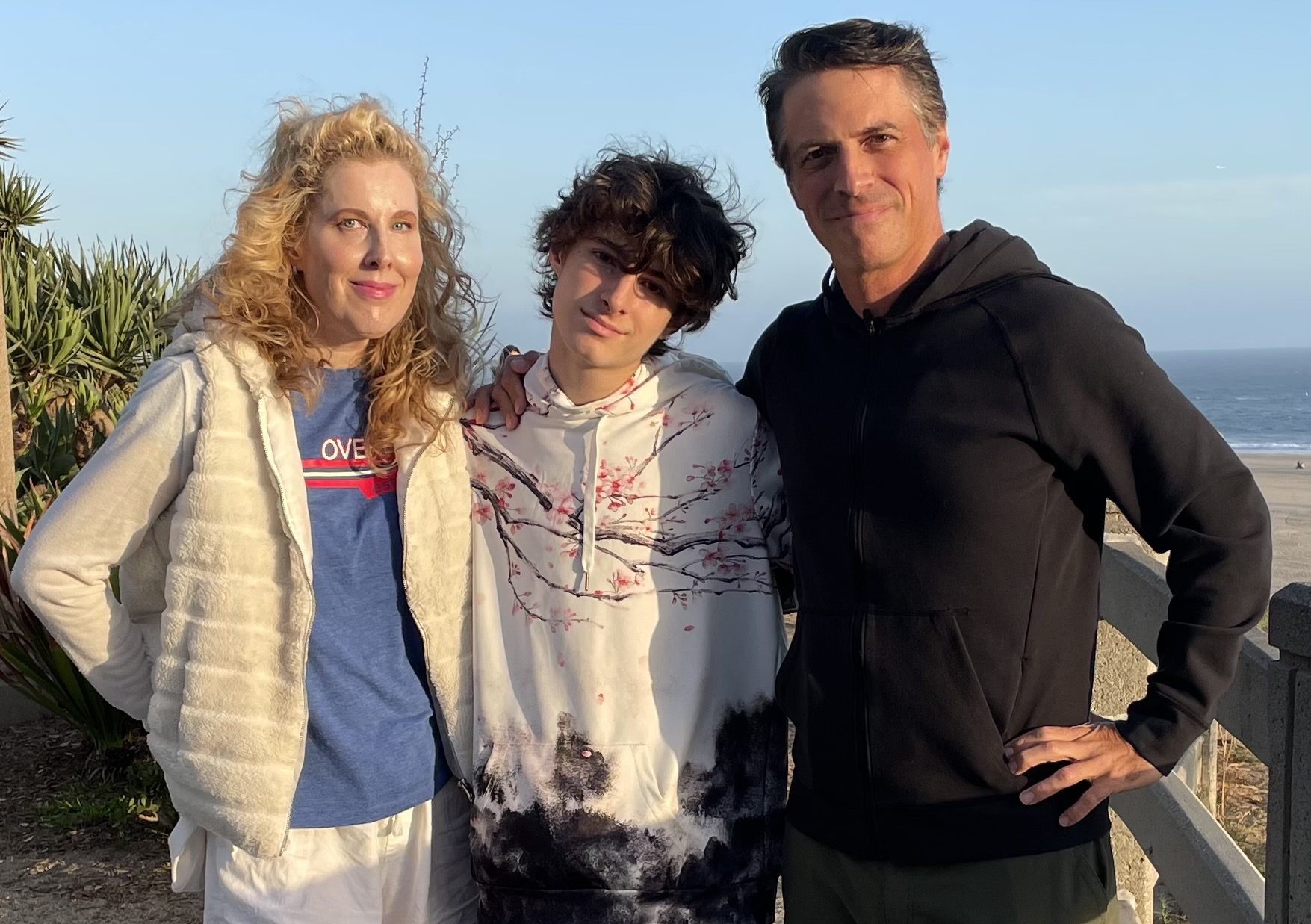 caption: Heidi Ferrer (left), Nick Guthe (right) and their son Bexon (middle). (Courtesy of Nick Guthe)