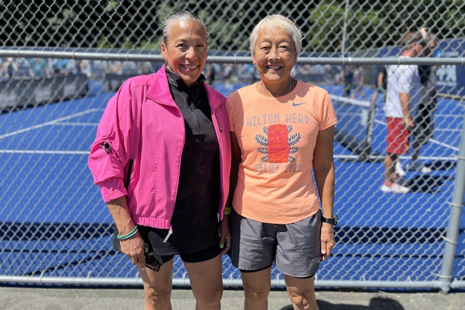 caption: Debra Brownlee (left) and Julie Farrenkopf (right) are friends and pickleball partners. 