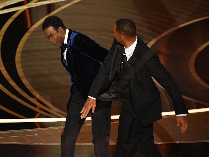 caption: Actor Will Smith (R) slaps comedian Chris Rock onstage during the 94th Oscars at the Dolby Theatre in Hollywood, California on Sunday.
