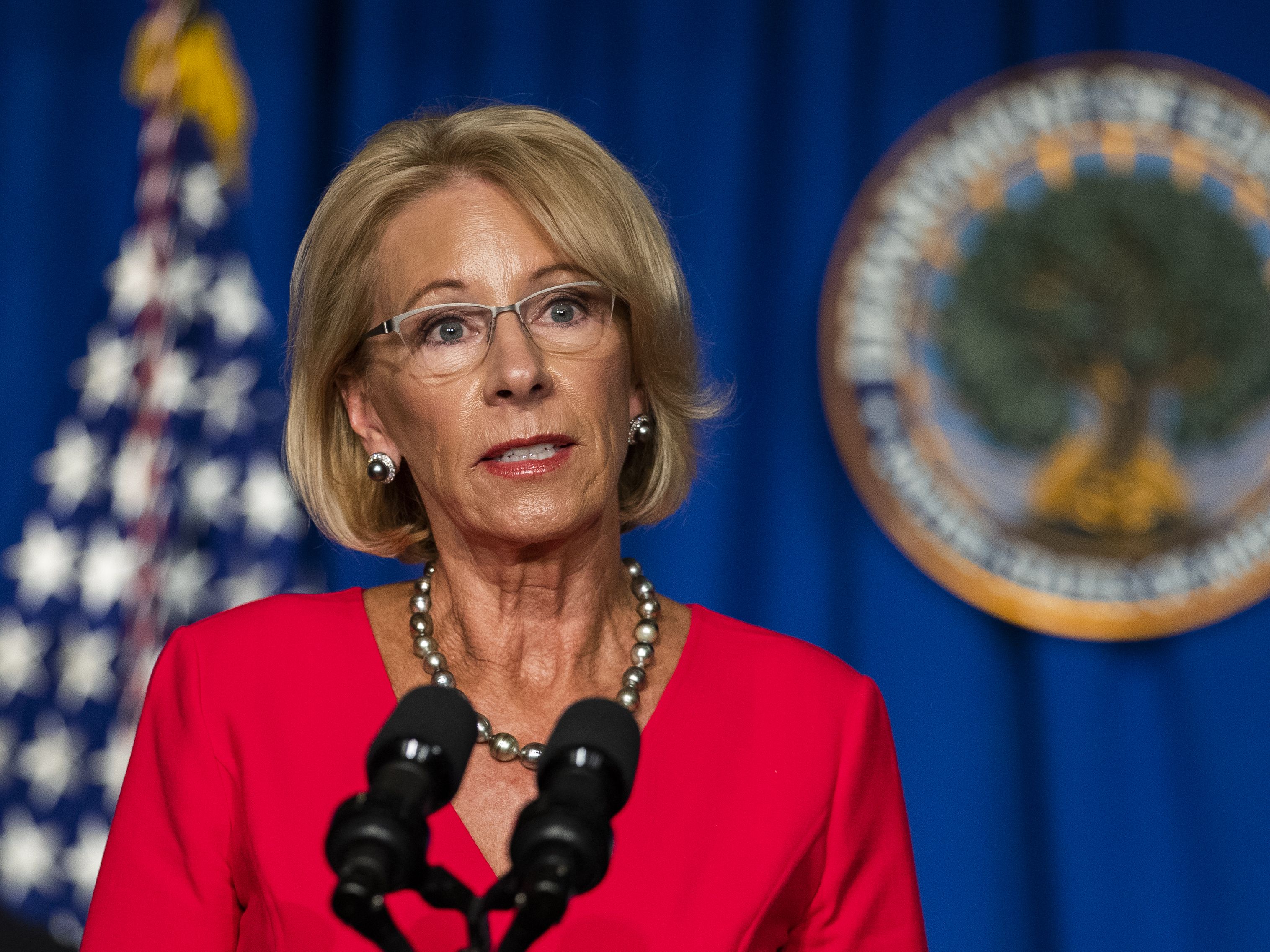 caption: Education Secretary Betsy DeVos speaks during a White House Coronavirus Task Force briefing at the Department of Education building.