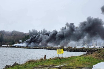 caption: A fire broke out at Ilwaco Landing in the small fishing town of Ilwaco, Wash. early Jan. 22, 2024. 