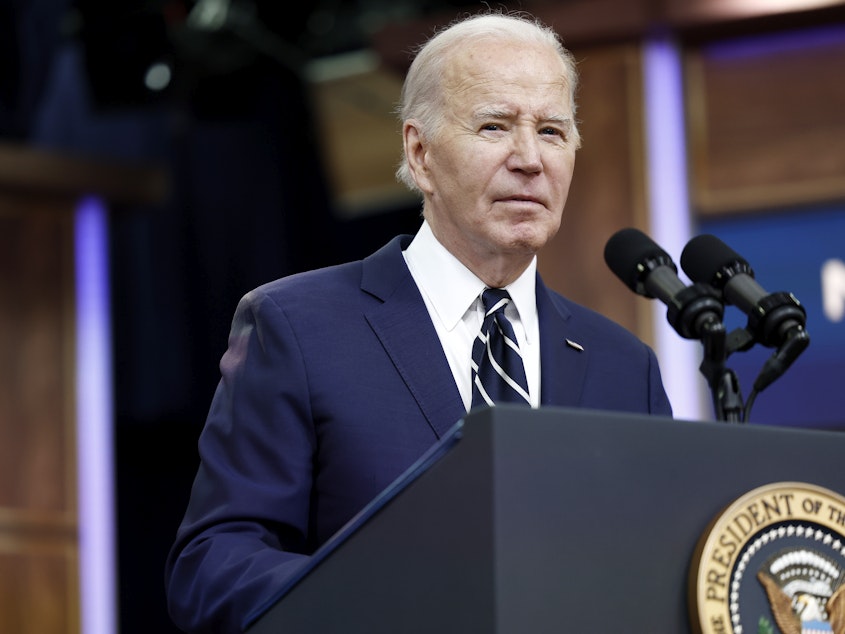 caption: President Biden briefly spoke to reporters about Iran in the South Court auditorium in the Eisenhower Executive Office Building on Friday.