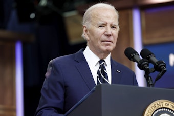 caption: President Biden briefly spoke to reporters about Iran in the South Court auditorium in the Eisenhower Executive Office Building on Friday.