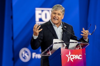 caption: Fox News host Sean Hannity, a close ally of former President Trump, speaks at the Conservative Political Action Conference (CPAC) in August 2022.