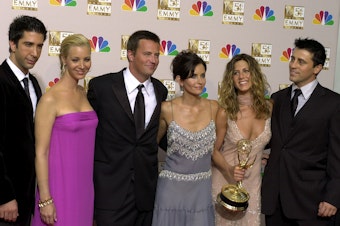 caption: The stars of <em>Friends</em>, from left, David Schwimmer, Lisa Kudrow, Matthew Perry, Courteney Cox Arquette, Jennifer Aniston and Matt LeBlanc pose after the show won outstanding comedy series at the 54th Annual Primetime Emmy Awards in 2002.