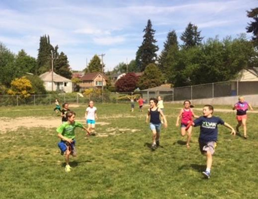 caption: Fourth-graders at Schmitz Park Elementary in West Seattle play capture the flag in their outdoor P.E. class.