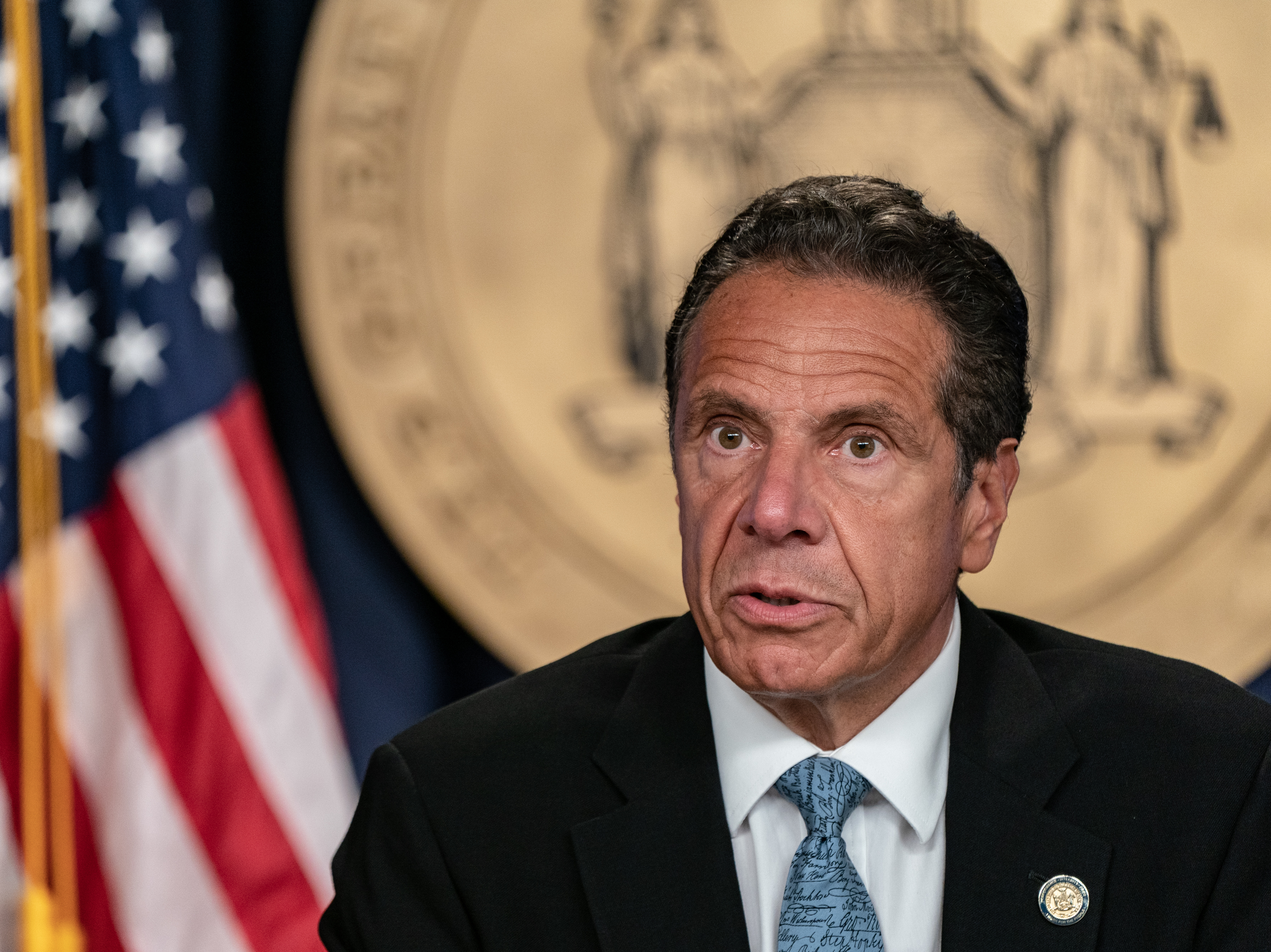 caption: New York Gov. Andrew Cuomo speaks during the daily media briefing on July 23, 2020 in New York City. A second former aide from his administration has come forward with allegations of sexual harassment from Cuomo.