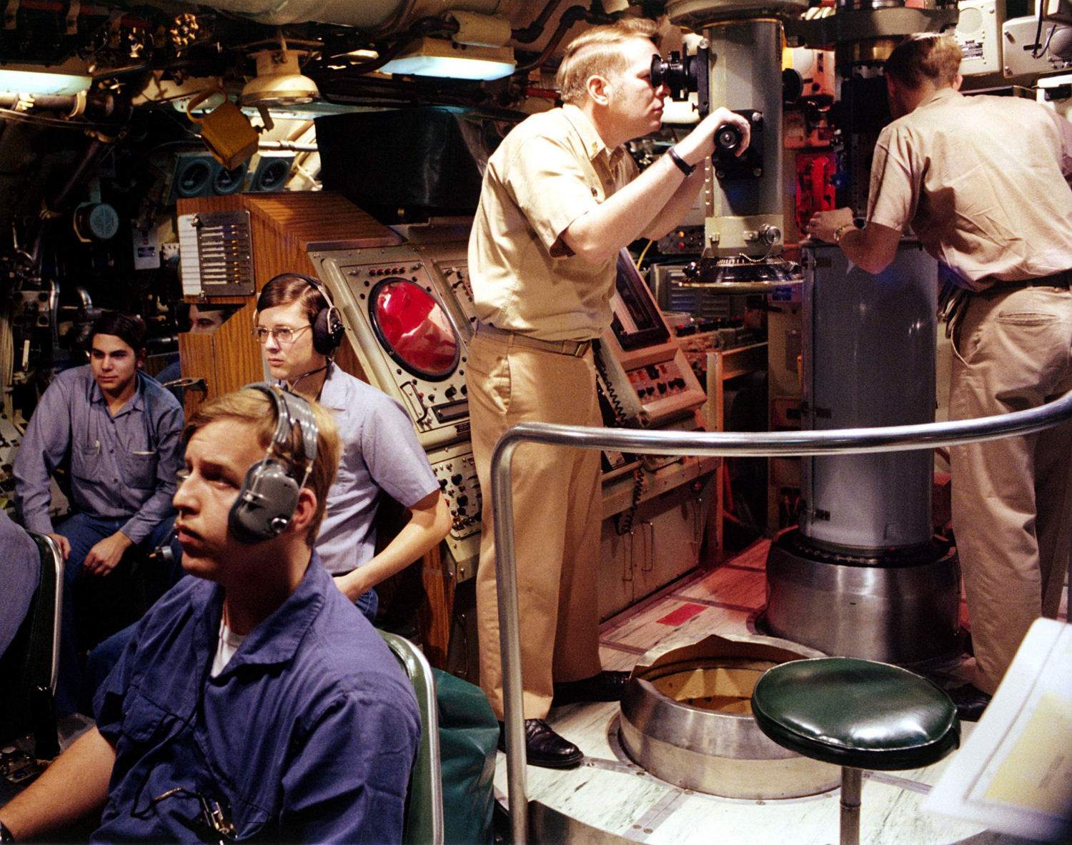 caption: The crew of an unidentified 'sturgeon class' submarine like the U.S.S. Parche, in 1980