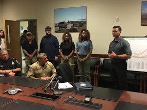 caption: Kevin McAleenan (right), the Department of Homeland Security acting secretary, introduced four volunteers from DHS agencies who came to the El Paso area in recent weeks to help care for and process migrants. McAleenan was in El Paso on Thursday for briefings on current border conditions.