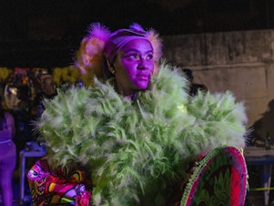 caption: Joyce Cecília, 27, member of the Brilhetes all-women bate-bola crew after the group's first carnival outing in Anchieta, Rio de Janeiro on February 09, 2023.