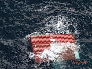 caption: Shipping containers spilled from the cargo ship Zim Kingston about 40 miles west of Cape Flattery on Washington's Olympic Peninsula