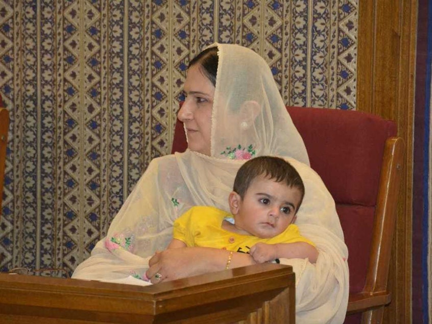 caption: Assemblywoman Mahjabeen Sheran on the day she brought her 8-month-old son to a session in Pakistan's Balochistan province. The secretary of the assembly said babies were against the rules.