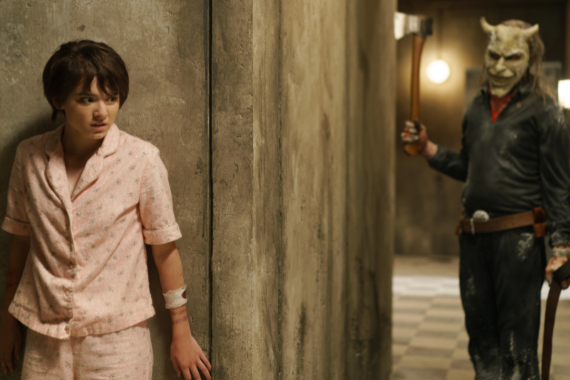 caption: Gwen (Madeleine McGraw) and The Grabber (Ethan Hawke) in "Black Phone 2," released October 2025. 