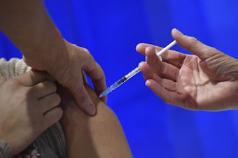 caption: Health care workers will be among the first to receive a coronavirus vaccine when they become available. But the vaccines have not been tested on pregnant people, raising questions about whether pregnant and lactating health care workers should get the shot.