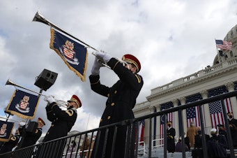 caption: The U.S. Army Band "Pershing's Own" plays during the inauguration of Joe Biden as president of the United States, on the West Front of the U.S. Capitol on Wednesday.
