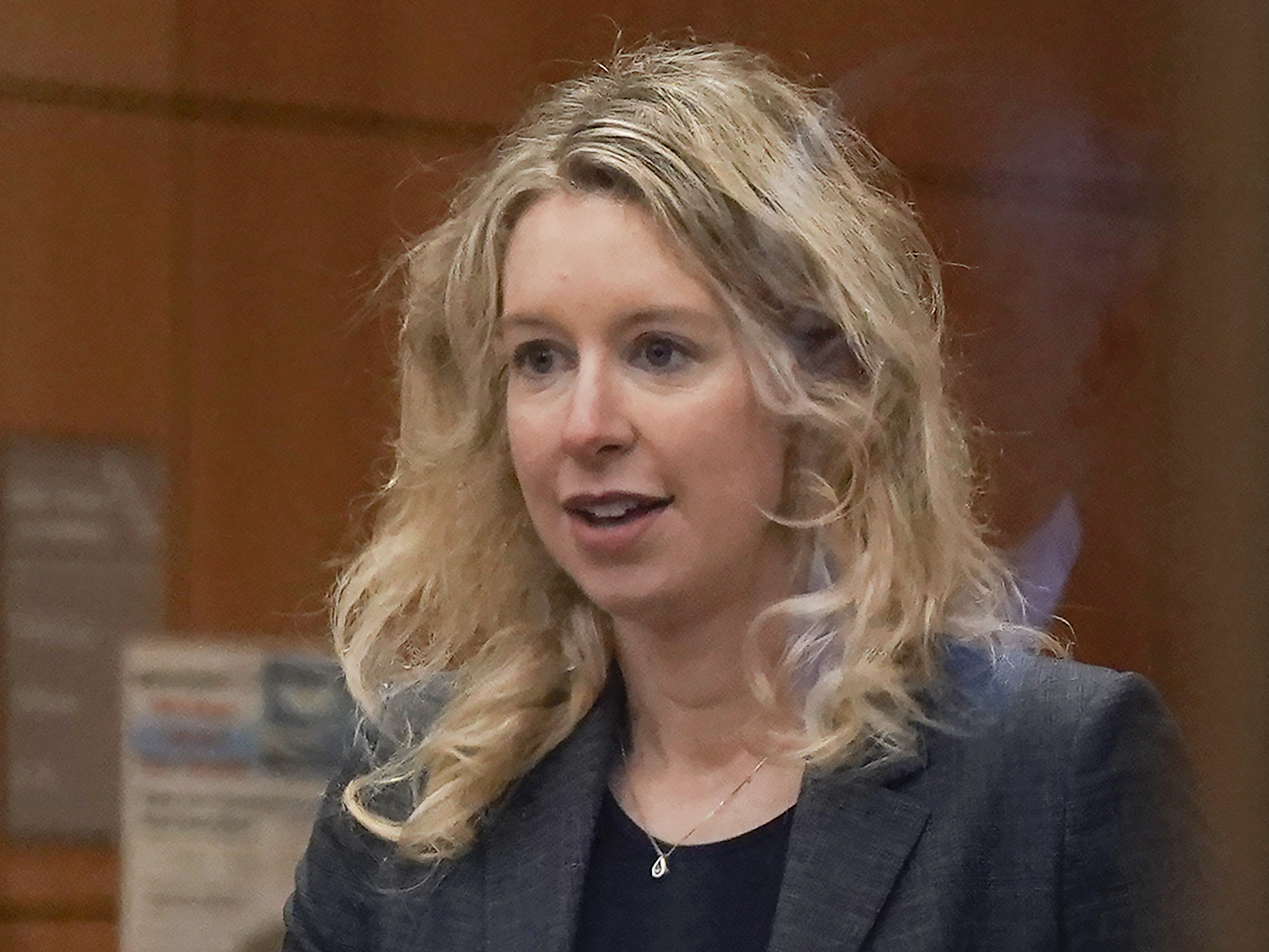 caption: Former Theranos CEO Elizabeth Holmes in federal court in San Jose, Calif. on Oct. 17.